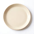 Danmero Ivory Serving Plate — top-down view showing the complete round face