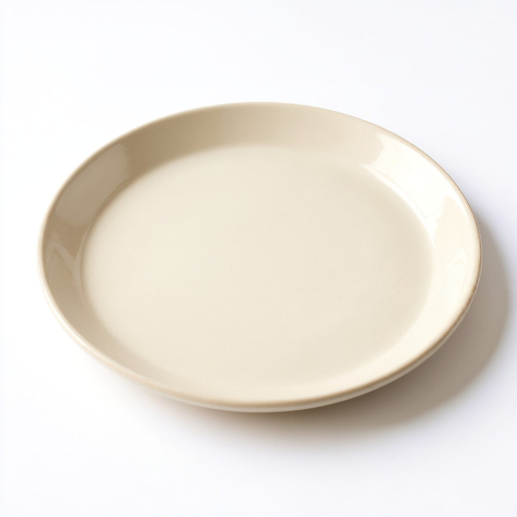 Danmero Ivory Serving Plate — three-quarter angled view showing full top face and rim