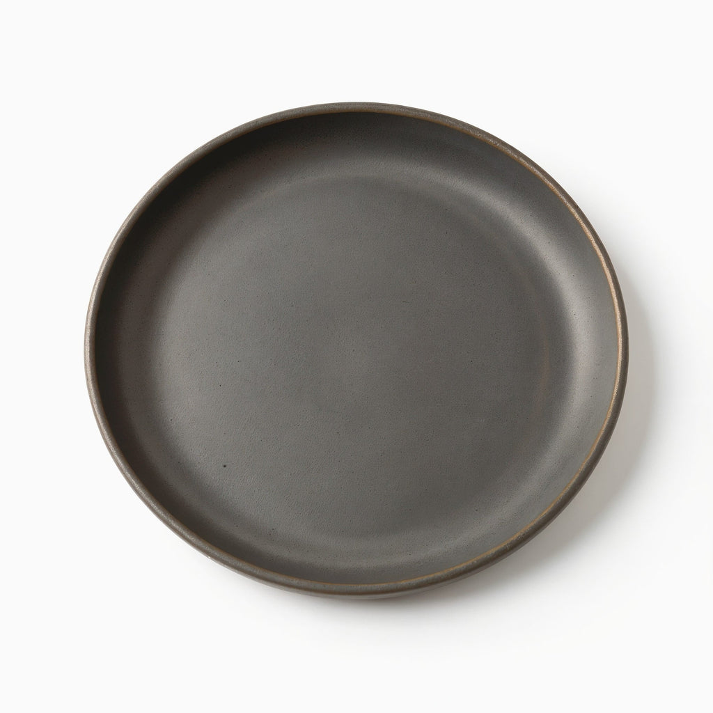 Danmero Charcoal Pasta Plate — top-down view showing full circular face and glaze