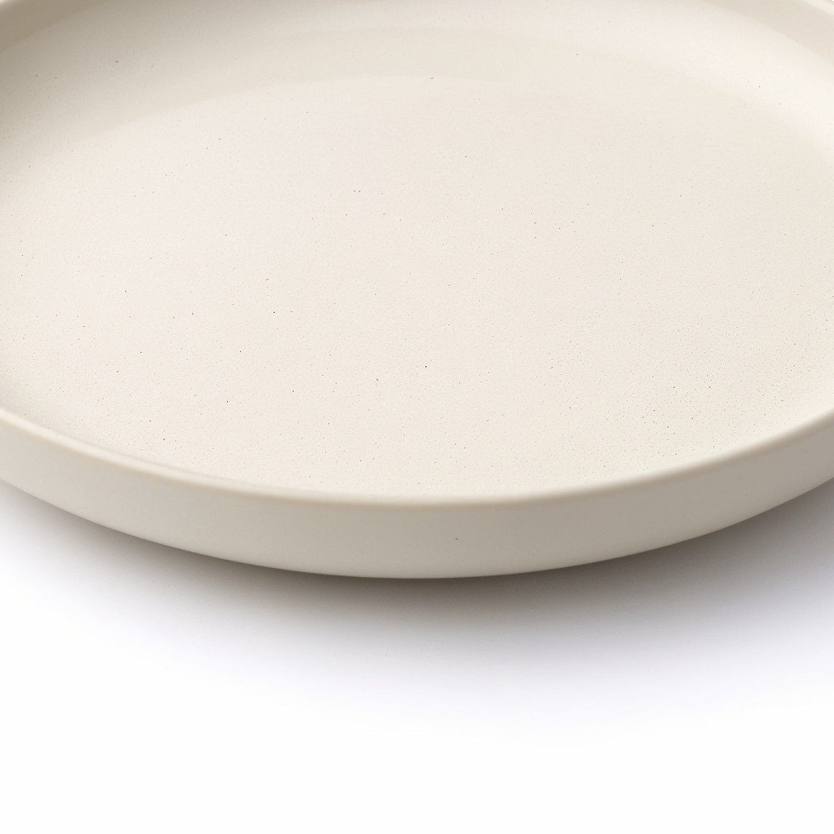 Danmero Plaster Serving Plate — macro close-up of the plate's raised rim detail