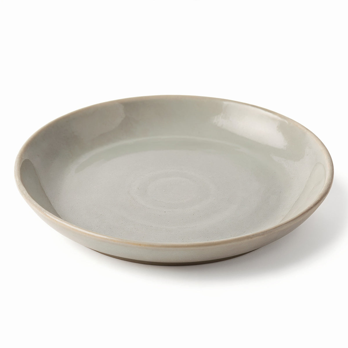 Danmero Pumice Pasta Plate — three-quarter angled view showing full top face and rim