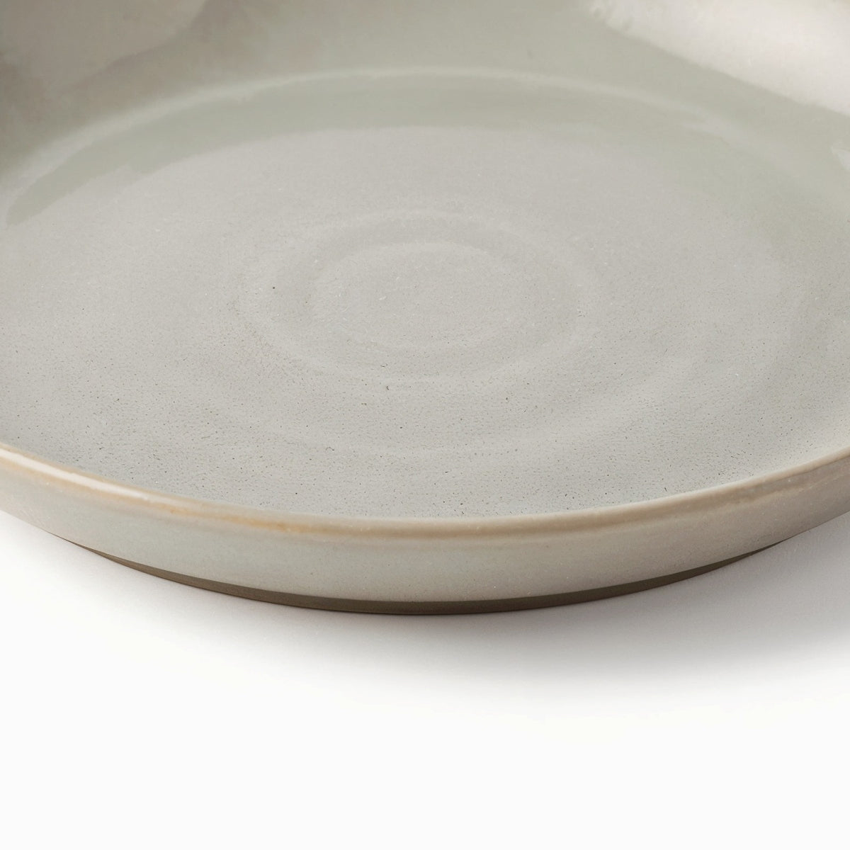Danmero Pumice Pasta Plate — macro close-up of the raised rim detail
