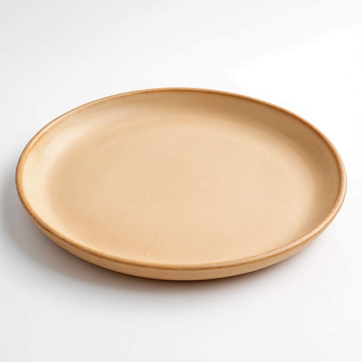 Danmero Apricot Dinner Plate — three-quarter angled view showing full top face and glaze