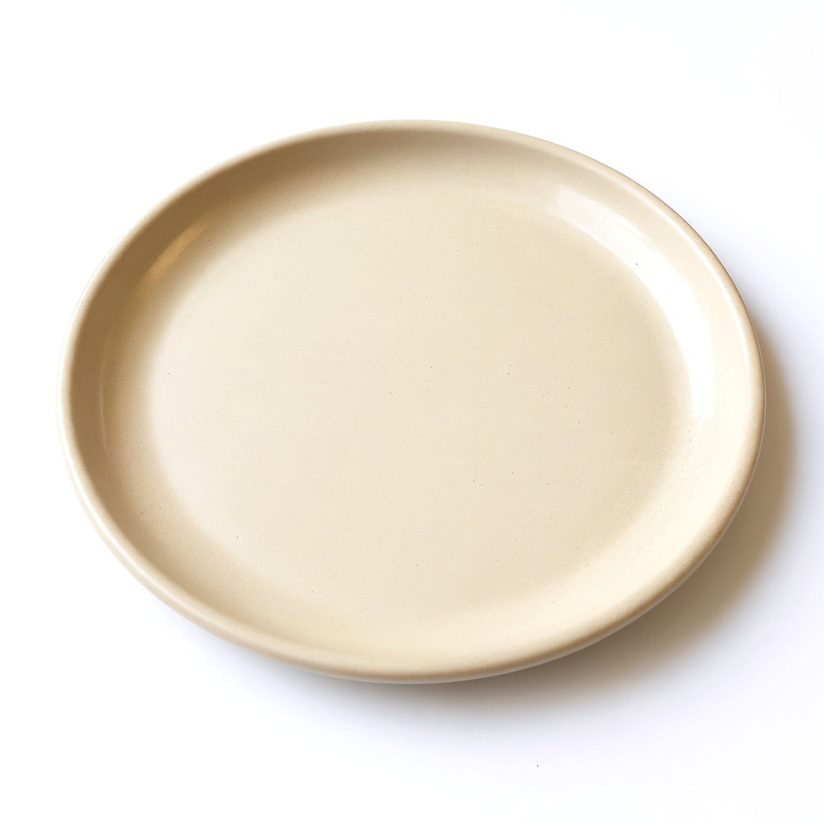 Danmero Flax Side Plate — three-quarter angled view showing top face and rim