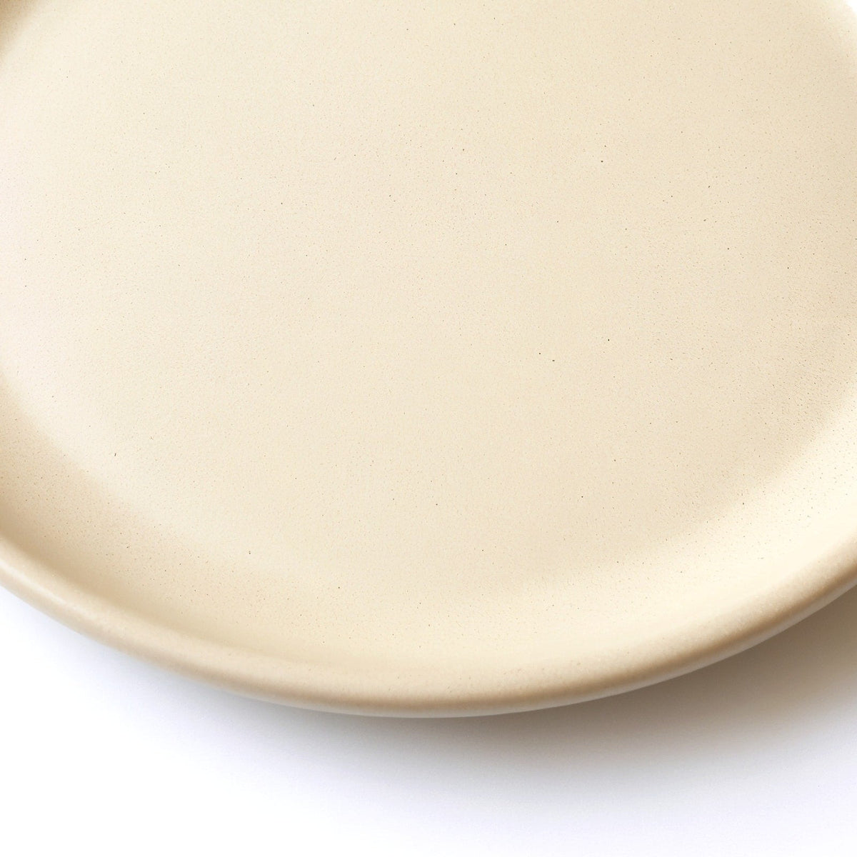 Danmero Flax Side Plate — macro detail of the raised rim and glaze pooling