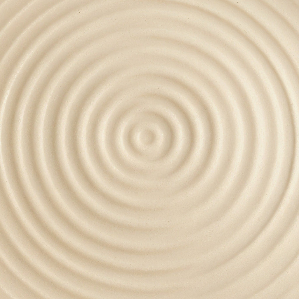 Danmero Parchment Bread Plate — macro close-up of the glaze surface texture