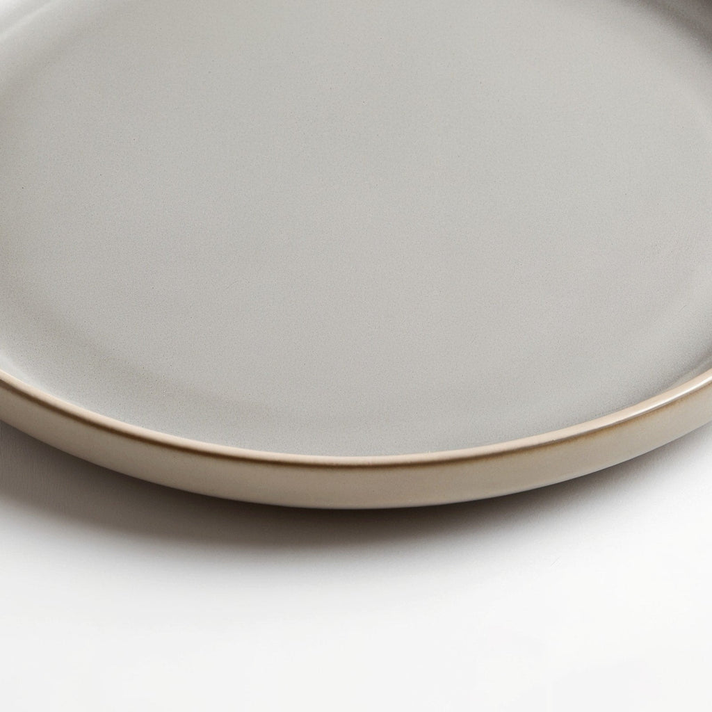Danmero Pebble Dinner Plate — close-up of raised rim and glaze pooling