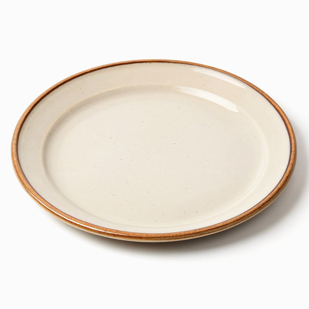 Danmero Sandstone Dessert Plate — three-quarter angled view showing full top face and glaze
