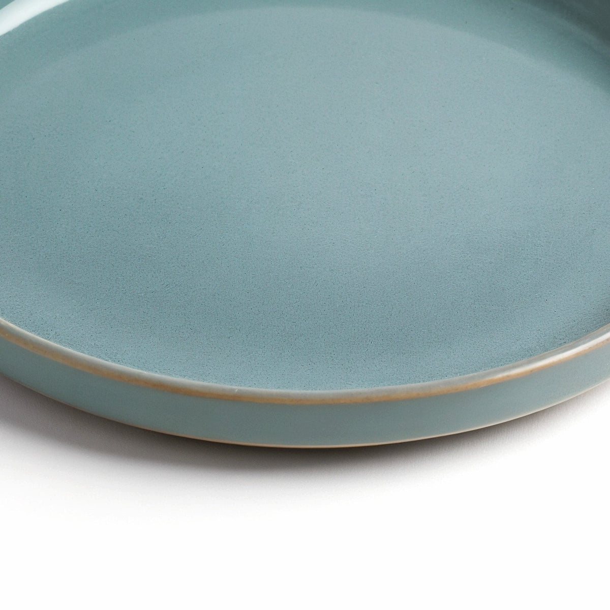 Danmero Slate Blue Dessert Plate — close-up of the raised rim and glaze pooling