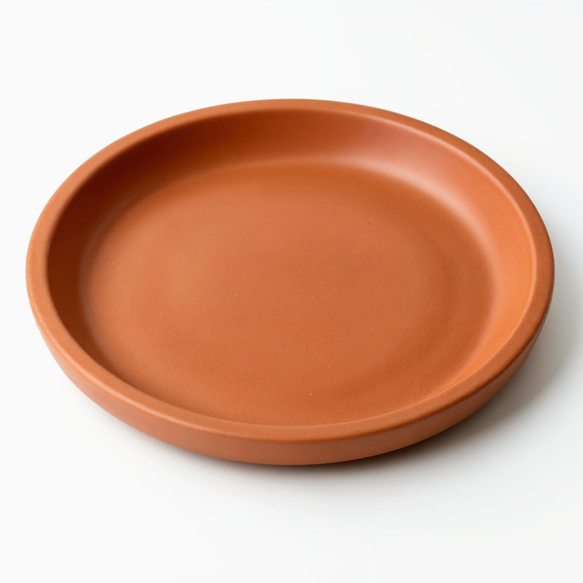 Danmero Terracotta Bread Plate — three-quarter angled view